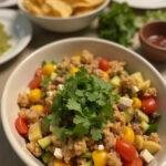 Delicious Meredith's Taco Salad ready to impress at a party or gathering.