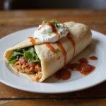 Final presentation of a Grey’s Anatomy Lunch Break Burrito, showcasing a delicious meal perfect for lunch breaks, featuring fresh and vibrant garnishes.