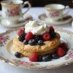 Final presentation of Downton Abbey Daisy's Dairy Delight Scones, beautifully styled for an afternoon tea experience.