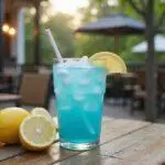 Indulge in the delightful presentation of Frozen Arendelle Aqua Lemonade, showcasing its stunning blue hue and refreshing summer appeal.