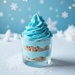 Final presentation of Frozen Elsa's Ice Palace Parfait, featuring blue layers and winter-themed decor on a white table, perfect for a magical dessert.