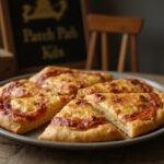 Deliciously baked Harry Potter Quidditch Pitch Pizza Puffs served on a rustic table, perfect for fans and party snacks.