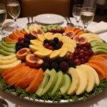 Overhead view of the Squid Game The Front Man's Formal Fruit Platter, showcasing the vibrant arrangement against an elegant backdrop.