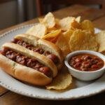Final display of Stranger Things Hawkins High School Hawkin' Dogs with chips and chili, creating an inviting dining experience.