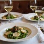 Served The Devil Wears Prada Anne Hathaway's Chic Caesar Salad on a dining table, elegant presentation, perfect for a stylish meal.