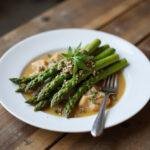 A stunning presentation of The Hobbit Bard's Arrowhead Asparagus, a delightful dish ready to be enjoyed.