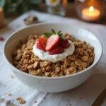 The final dish of The Lord of the Rings Gandalf's Grey Havens Granola served in a bowl with yogurt and fresh fruit, presenting a delightful and healthy breakfast.