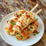 Colorful Scooby Doo themed giant hoagie sandwich skewers arranged on a rustic wooden plate with vibrant fresh vegetables and deli meats, styled in a playful and cartoon-inspired manner