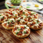 Colorful mini pizzas inspired by Toy Story's Pizza Planet with bright red and green toppings, playful toy-shaped crusts, and a whimsical presentation on a rustic wooden plate, vibrant and inviting.