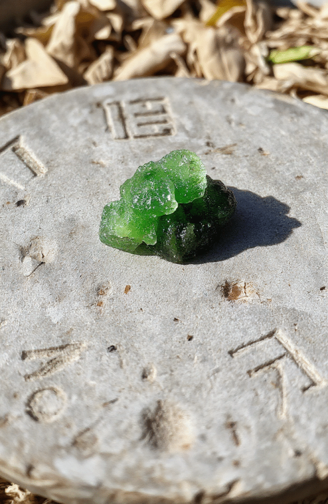 A vibrant green-and-white swirl rock candy lattice sitting on a weathered Kryptonian crystal slab, with subtle glowing green embers and faint Krypton script engraved along the edges, backdrop of Metropolis skyline at sunset in soft focus
